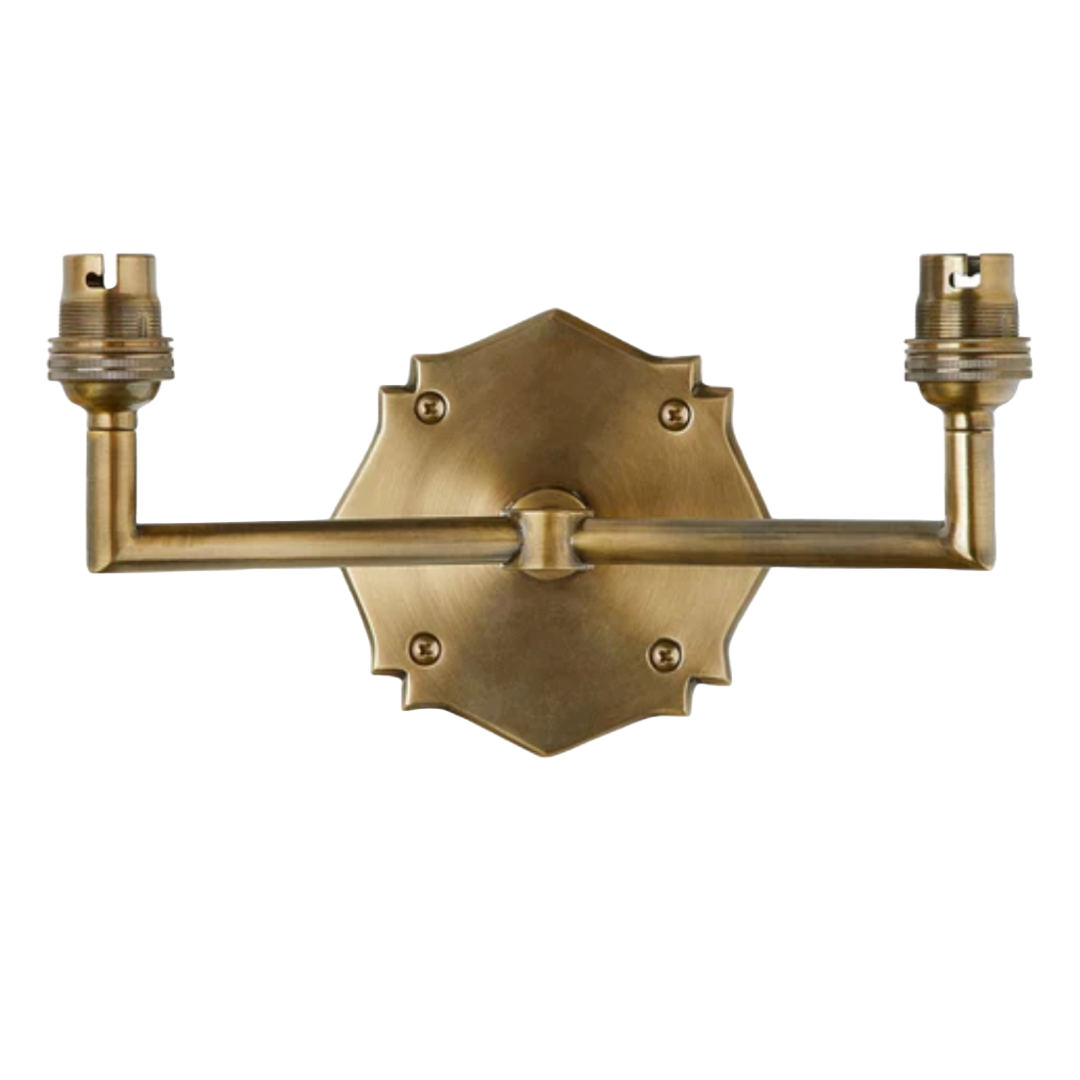 double insignia wall fitting in antique brass